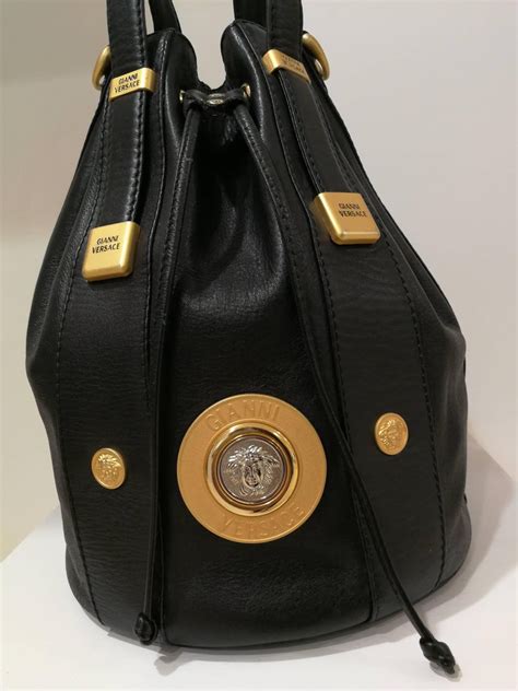 versace backpack gold|black versace purse.